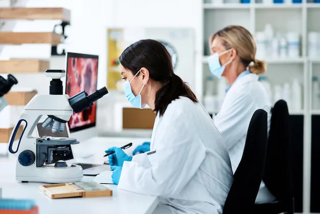 woman scientist microscope with analysis science lab medical research innovation female people technology study pharmaceutical chemistry biology vaccine career phd 590464 511696